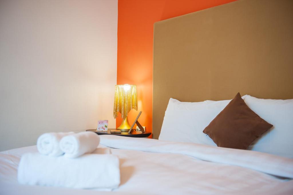 Postel nebo postele na pokoji v ubytování Hai Pu B&B