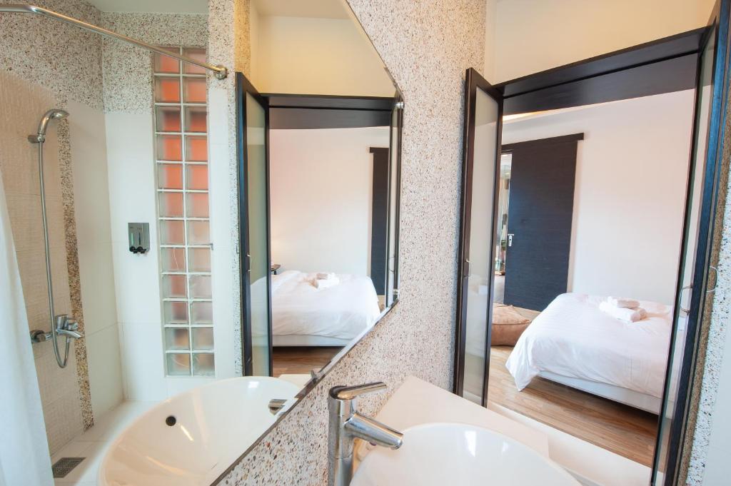 Postel nebo postele na pokoji v ubytování Hai Pu B&B