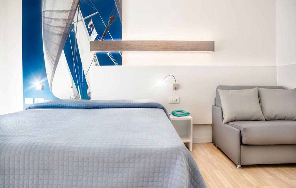 Postel nebo postele na pokoji v ubytování Hotel Antoniana