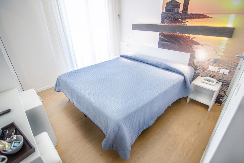 Postel nebo postele na pokoji v ubytování Hotel Antoniana