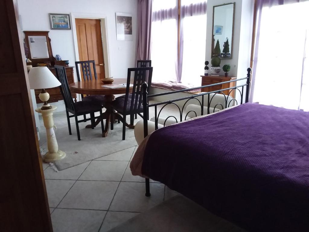 Postel nebo postele na pokoji v ubytování Le Patronage
