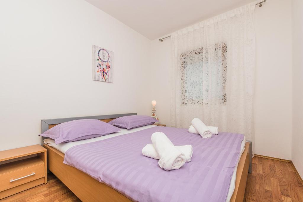 Postel nebo postele na pokoji v ubytování Apartment Matošić