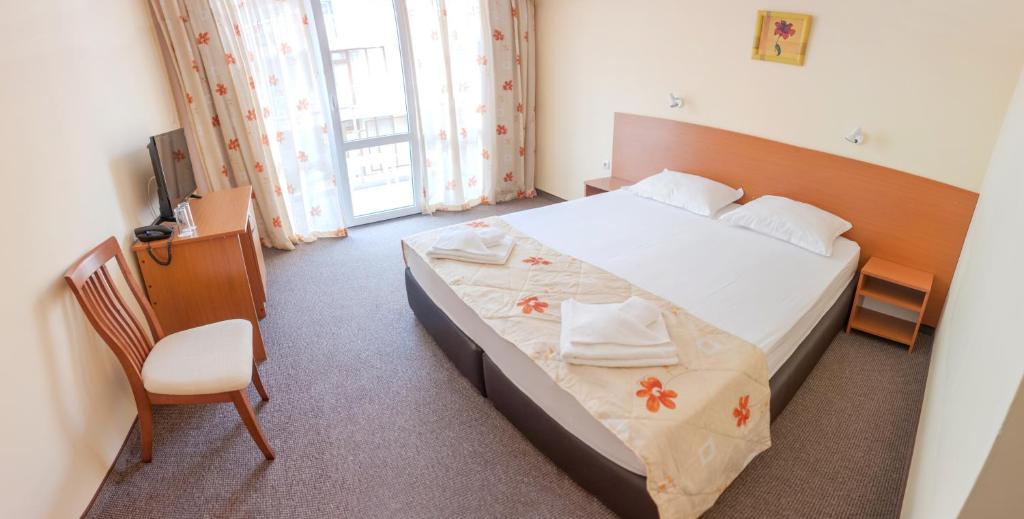 Postel nebo postele na pokoji v ubytování Hotel Eva