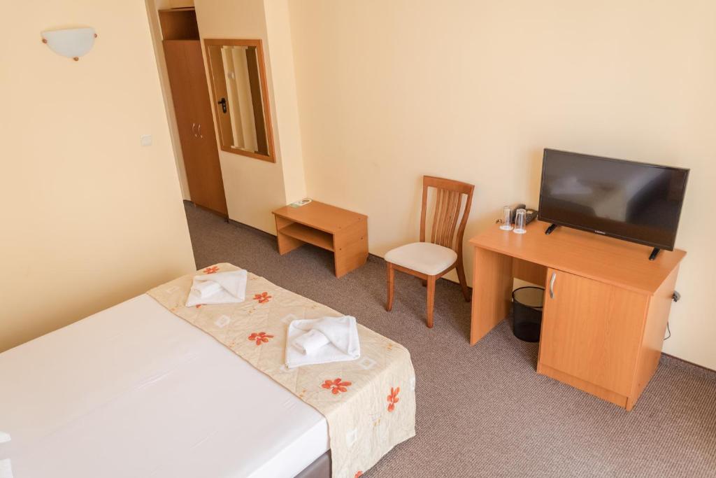 TV a/nebo společenská místnost v ubytování Hotel Eva