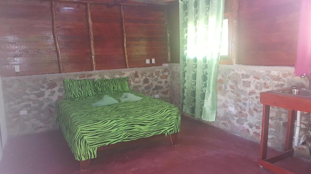 Postel nebo postele na pokoji v ubytování Villa La Caleta