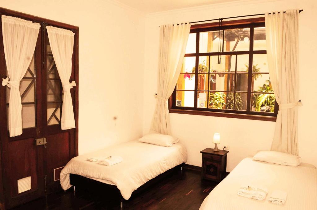 Postel nebo postele na pokoji v ubytování Arche Noah Boutique Hostel