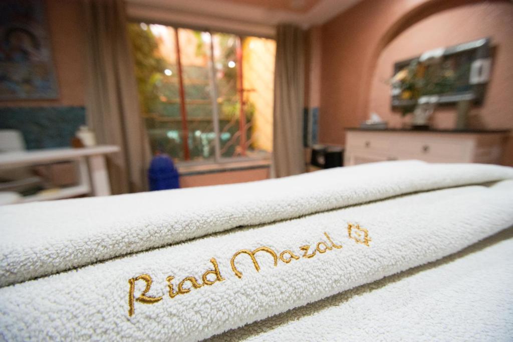 Postel nebo postele na pokoji v ubytování Riad Mazal