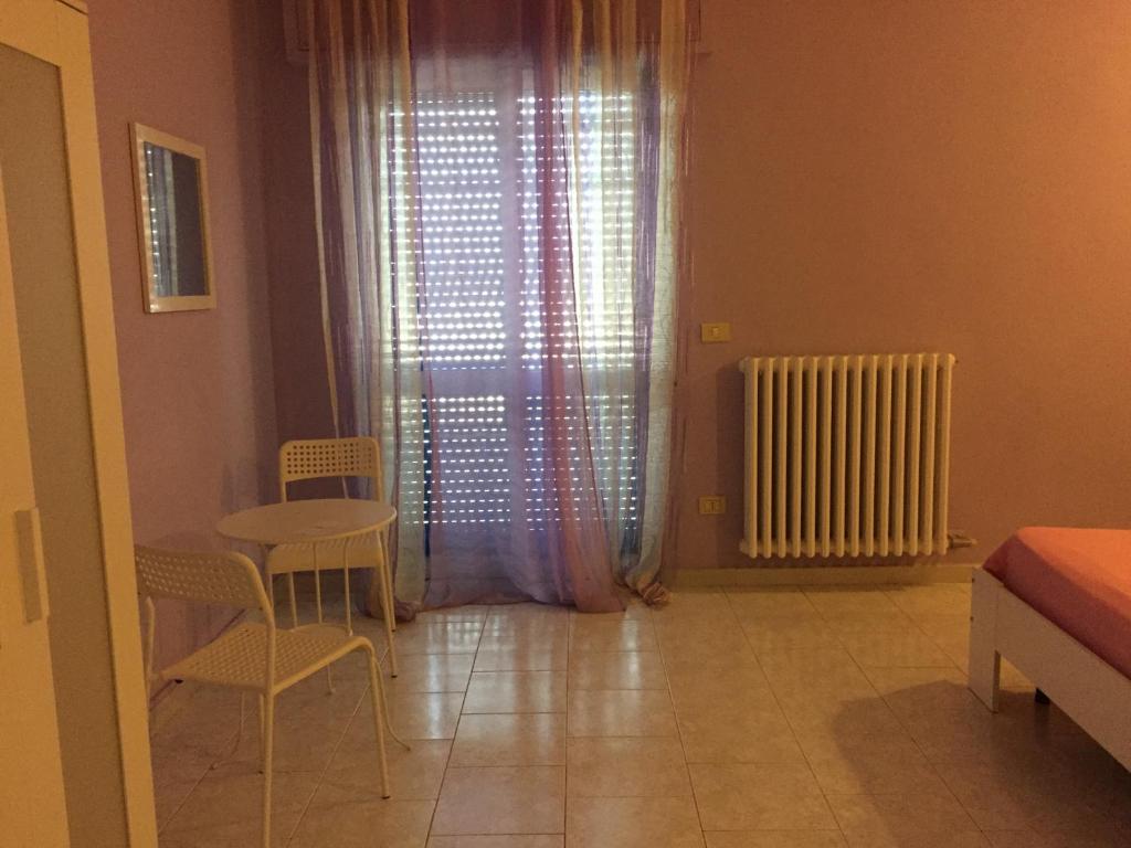 Postel nebo postele na pokoji v ubytování Albergo Lamanna Hotel digitale