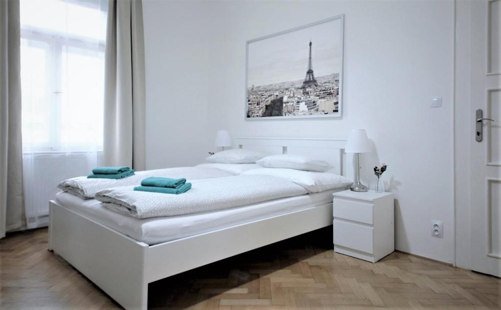 Postel nebo postele na pokoji v ubytování Angel City Aparthotel