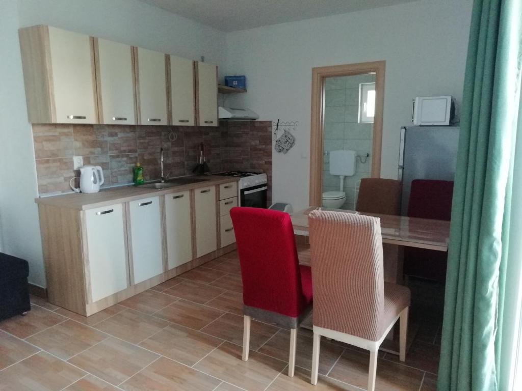 Kuchyň nebo kuchyňský kout v ubytování Apartment Eri