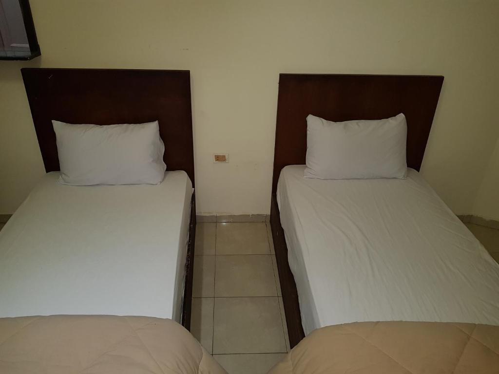 Postel nebo postele na pokoji v ubytování Hostel Vienna