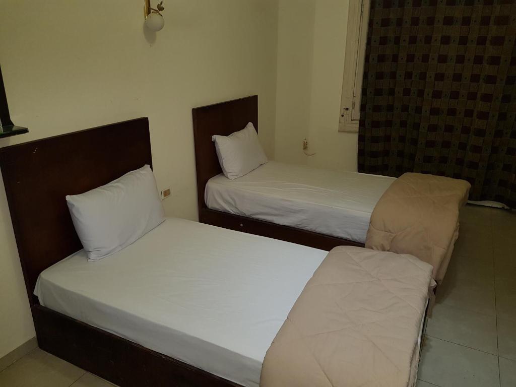 Postel nebo postele na pokoji v ubytování Hostel Vienna