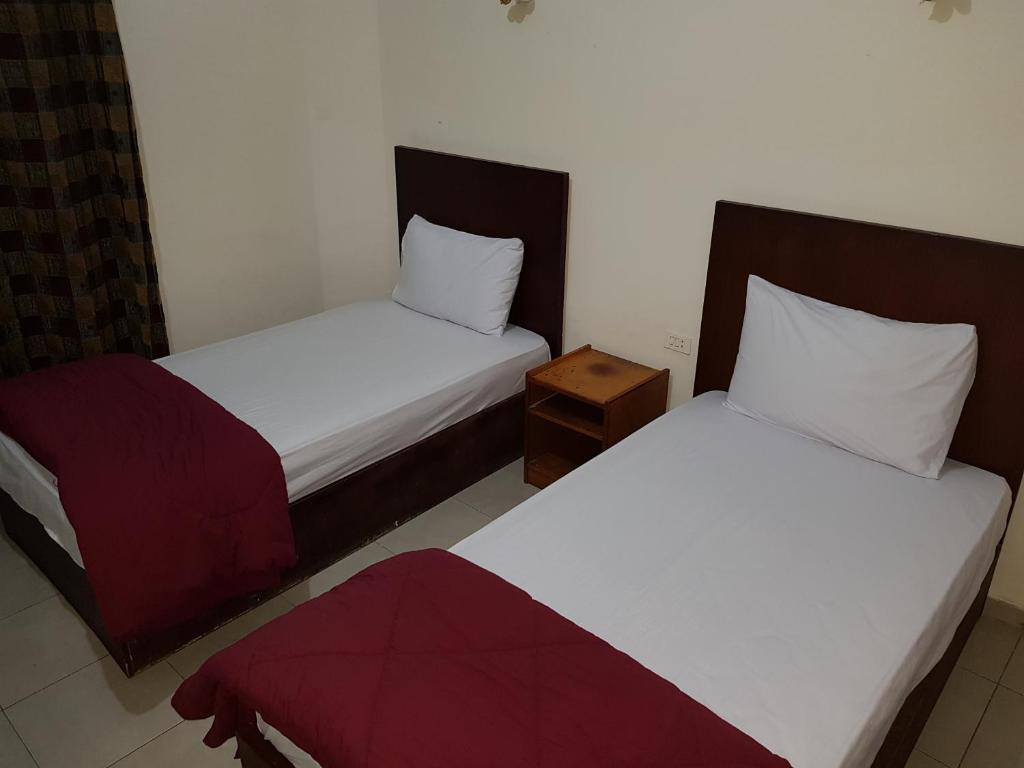 Postel nebo postele na pokoji v ubytování Hostel Vienna