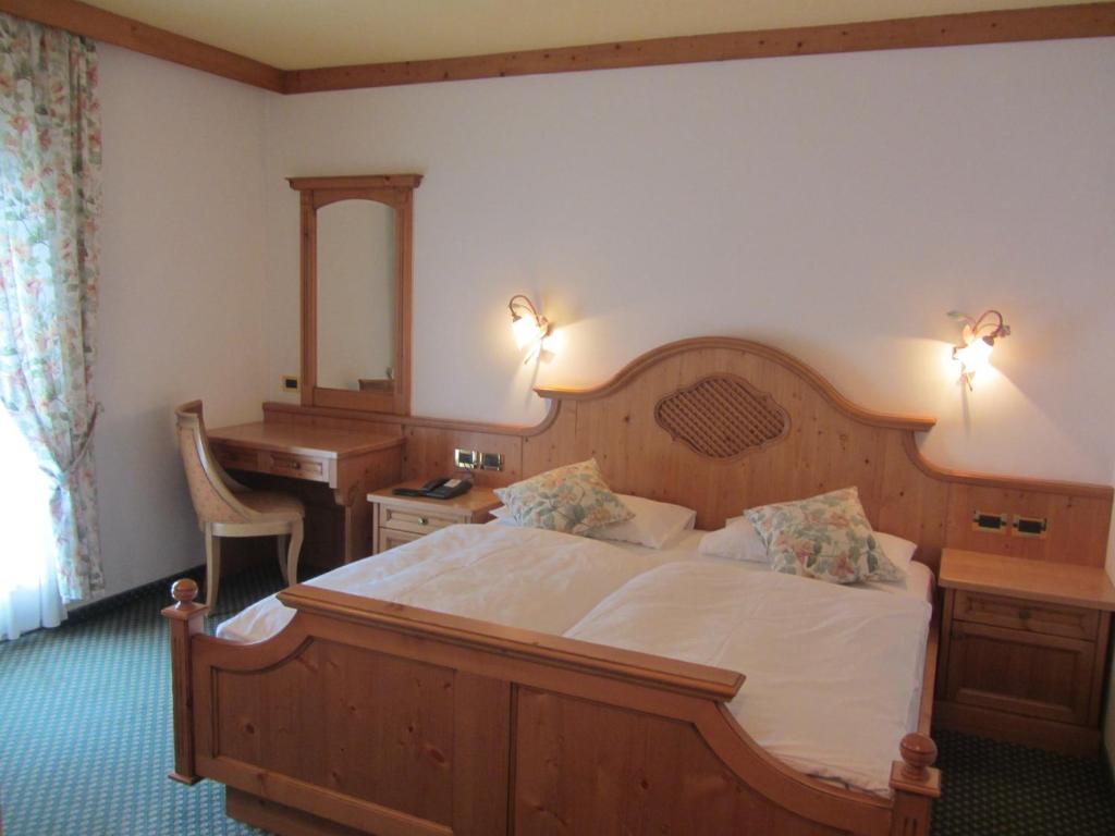 Postel nebo postele na pokoji v ubytování Park Hotel Aurora