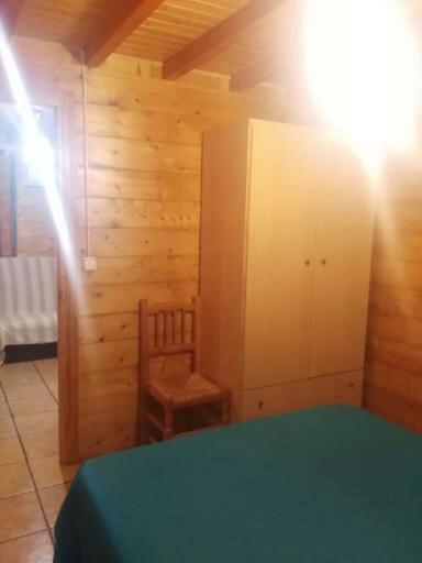 Postel nebo postele na pokoji v ubytování Cabañas El Robledo