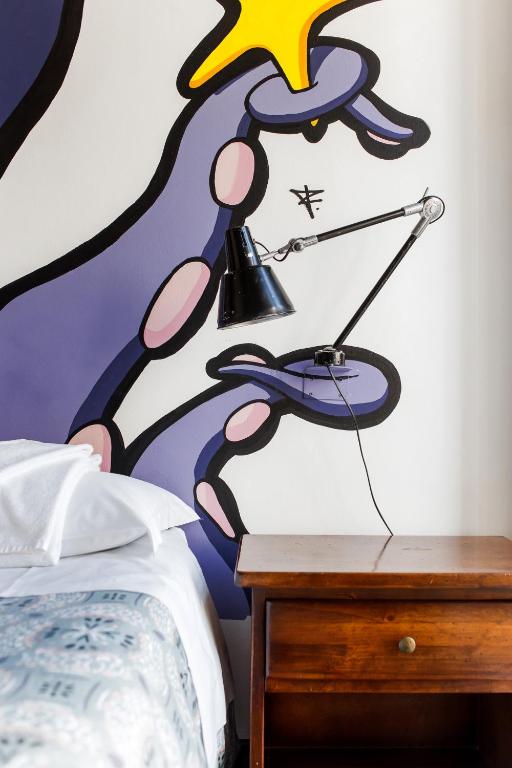 Postel nebo postele na pokoji v ubytování Albergo Ristorante San Giors