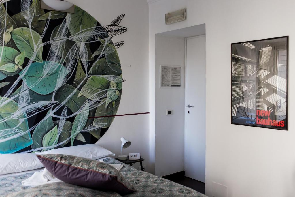 Postel nebo postele na pokoji v ubytování Albergo Ristorante San Giors