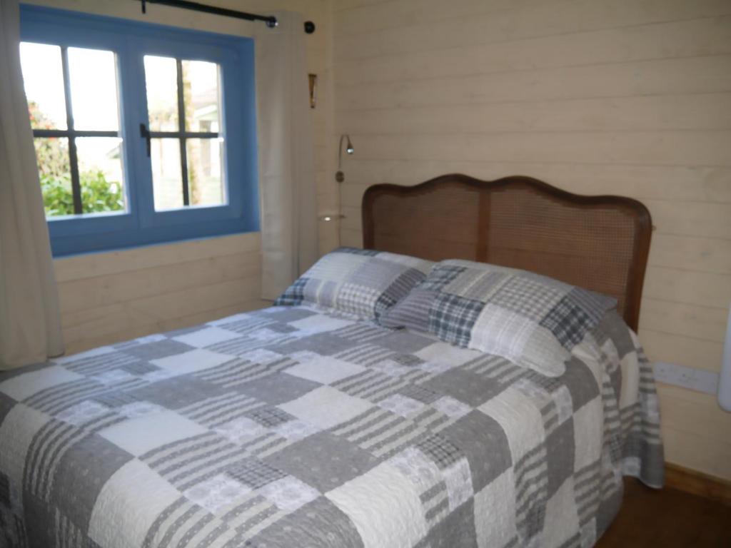 Postel nebo postele na pokoji v ubytování Rodeen