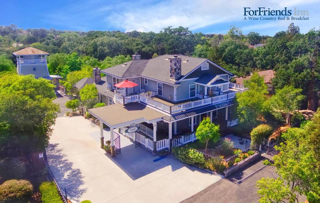 an overhead view of a large blue house with a roof at ForFriends Inn Wine Country Bed and Breakfast in Santa Ynez