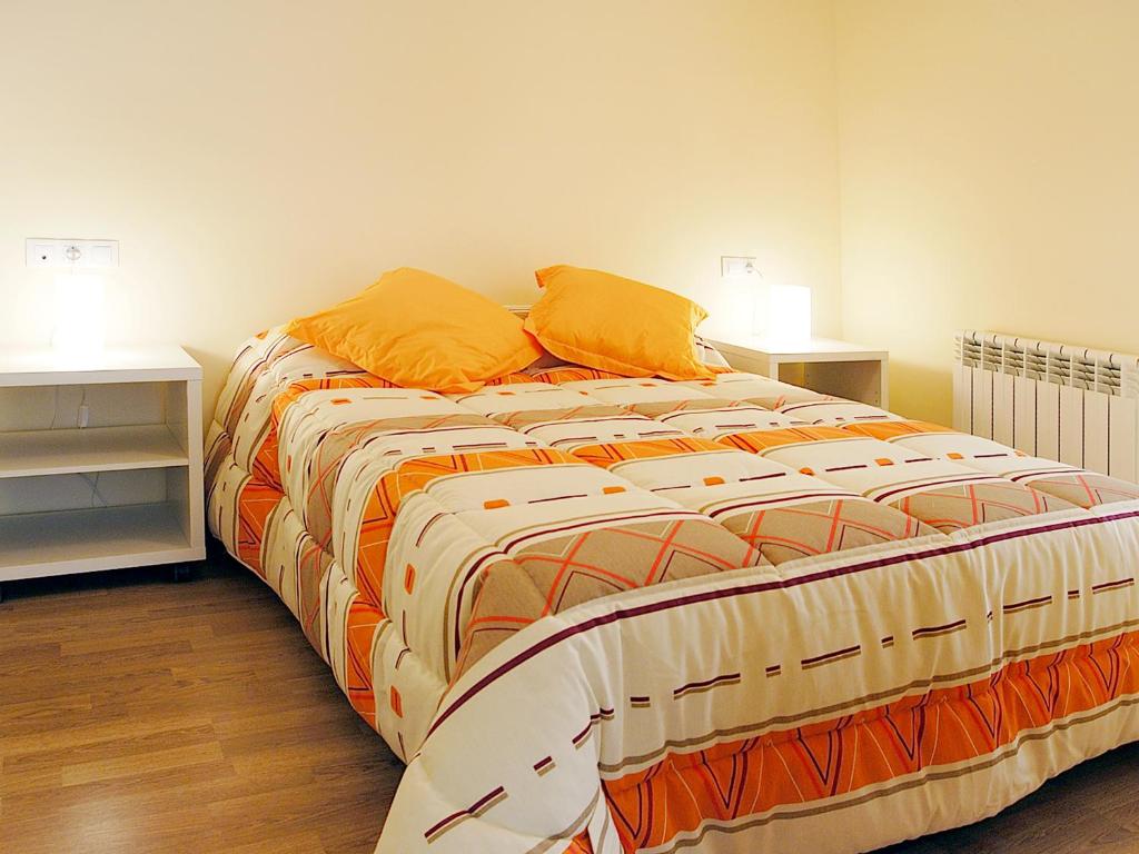 Posteľ alebo postele v izbe v ubytovaní Aparthotel Nou Vielha