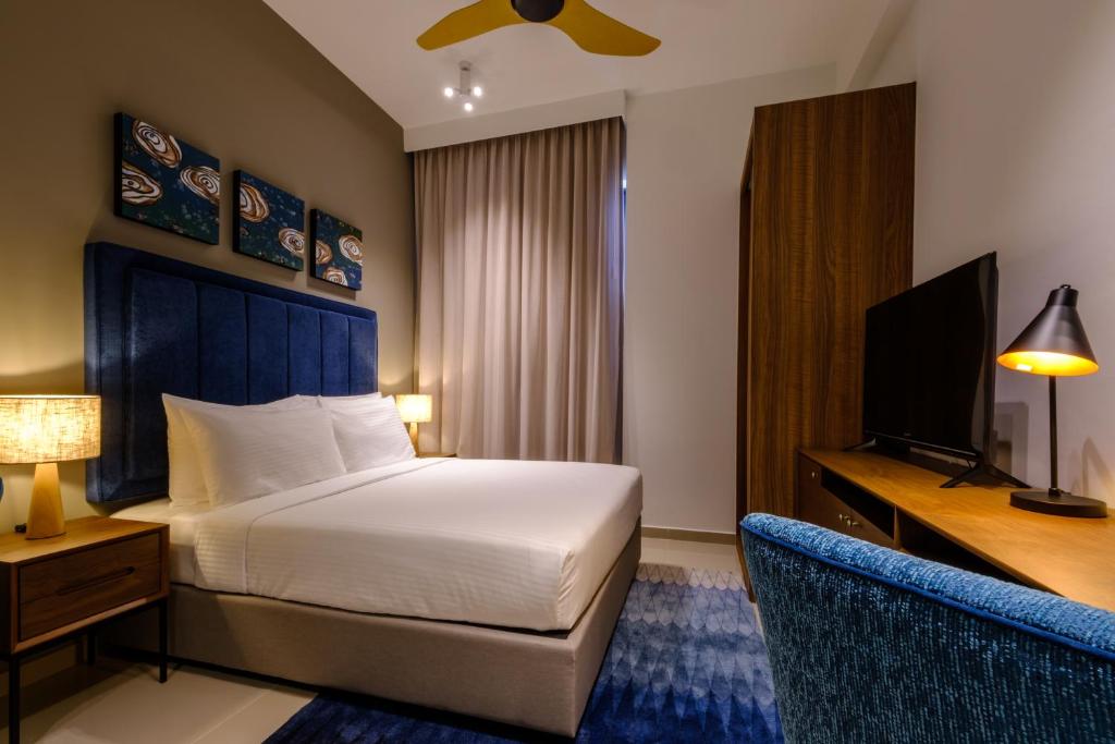 Postel nebo postele na pokoji v ubytování Tanjung Point Residences