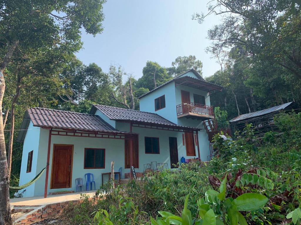 a house in the middle of a forest at The Small Guest House in Koh Rong Island
