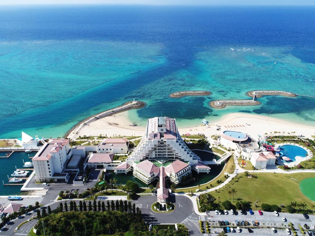 an aerial view of a resort and a beach at Sheraton Okinawa Sunmarina Resort in Onna