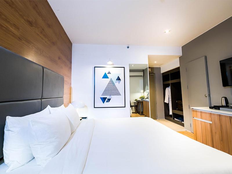 Postel nebo postele na pokoji v ubytování Avior Hotel