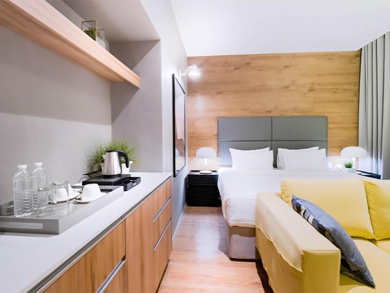 Postel nebo postele na pokoji v ubytování Avior Hotel