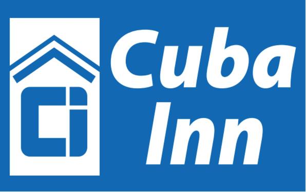 a blue and white logo for the clico inn at Cuba Inn in Cuba