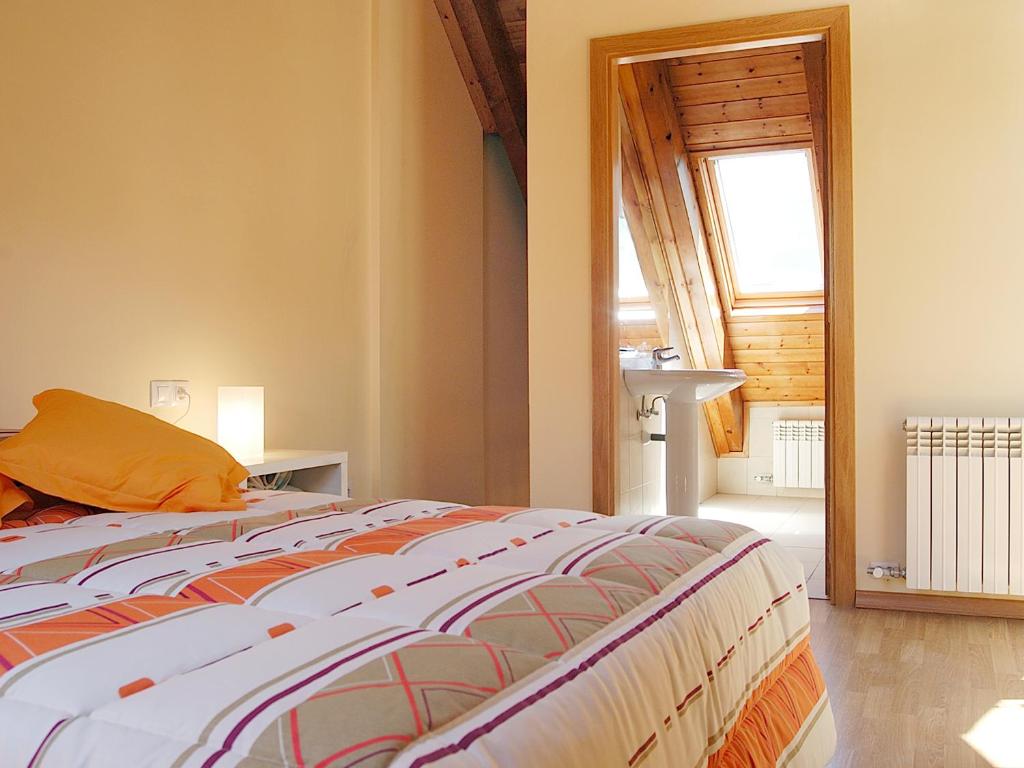 Posteľ alebo postele v izbe v ubytovaní Aparthotel Nou Vielha