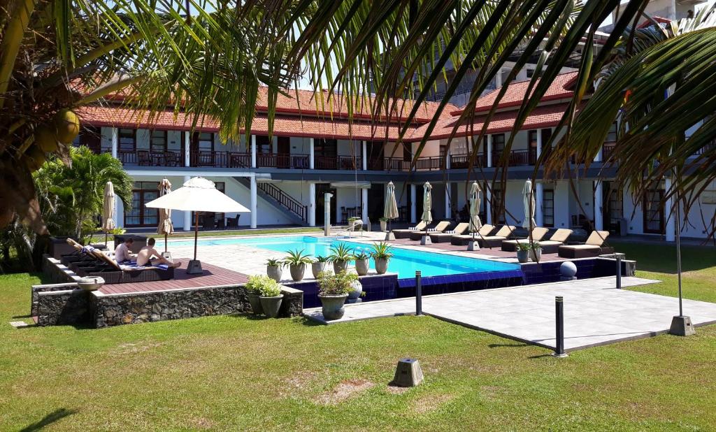 Bazén v ubytování IMAGINE Villa Hotel nebo v jeho okolí