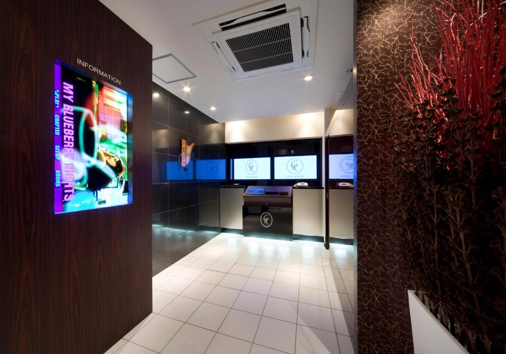 A television and/or entertainment centre at Carrot ISE (Adult Only)