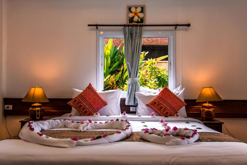 Postel nebo postele na pokoji v ubytování Zama Resort Koh Phangan