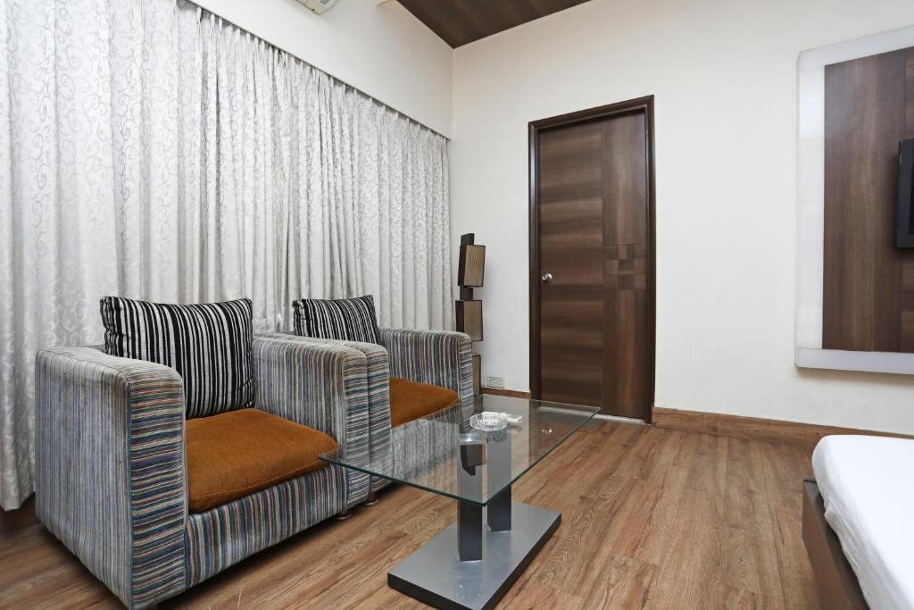 Posezení v ubytování Hotel Rushabh Home