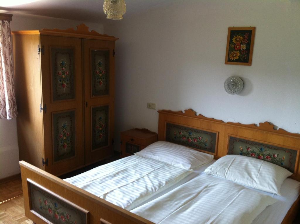 Postel nebo postele na pokoji v ubytování Gasthof Pension Steinberger
