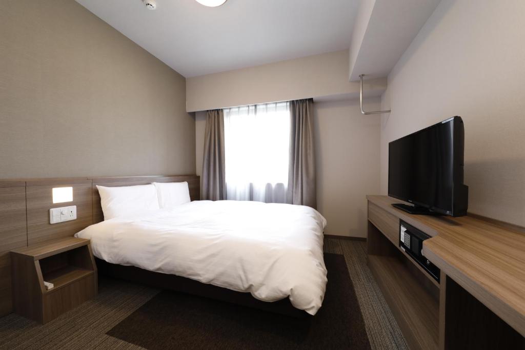 TV a/nebo společenská místnost v ubytování Dormy Inn Premium Fukui Natural Hot Spring