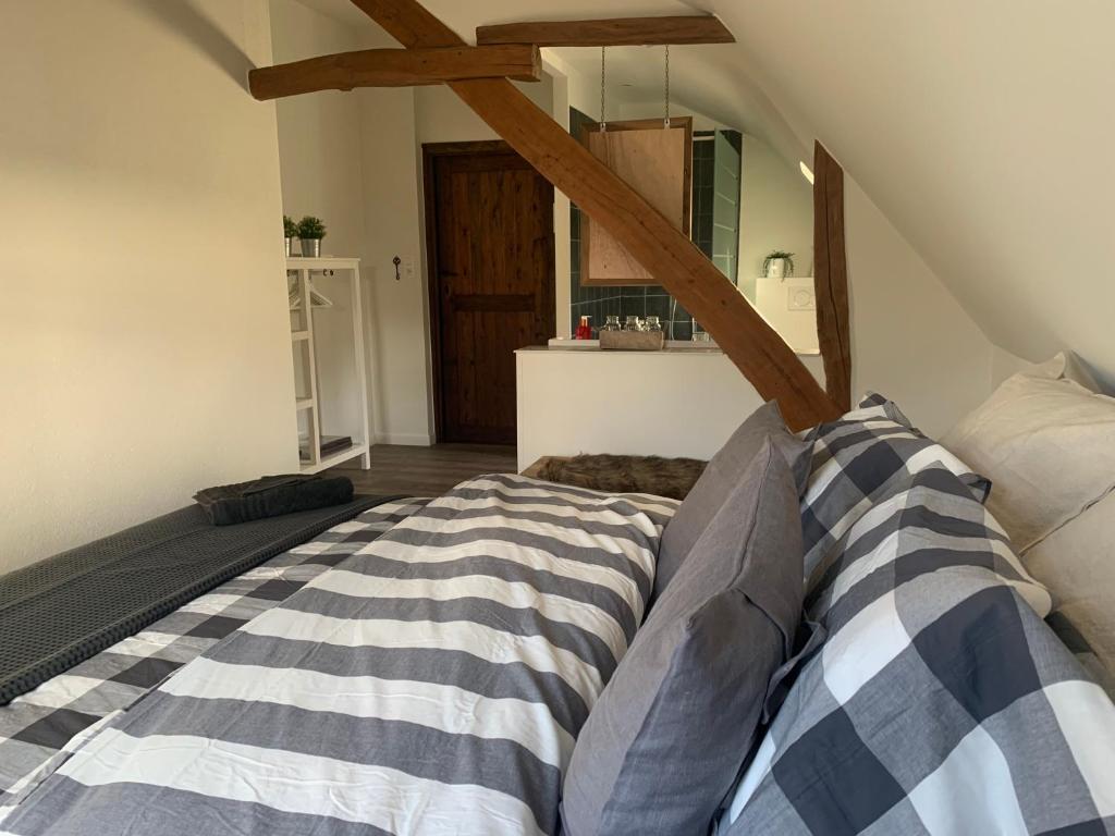 Postel nebo postele na pokoji v ubytování B&B Dageraad