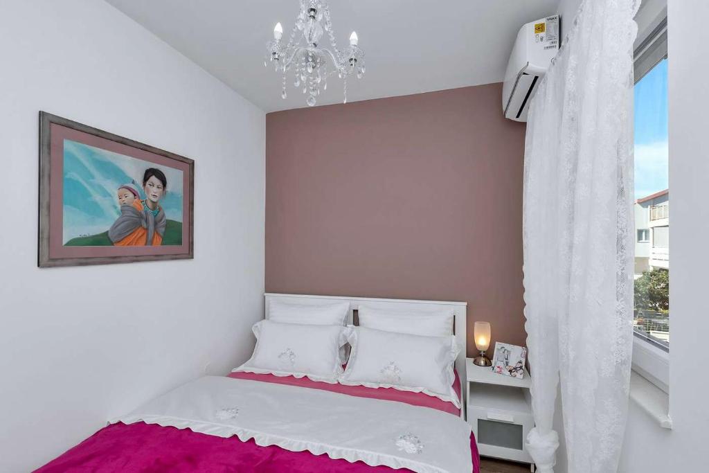 Postel nebo postele na pokoji v ubytování Luxurious Apartment Nino