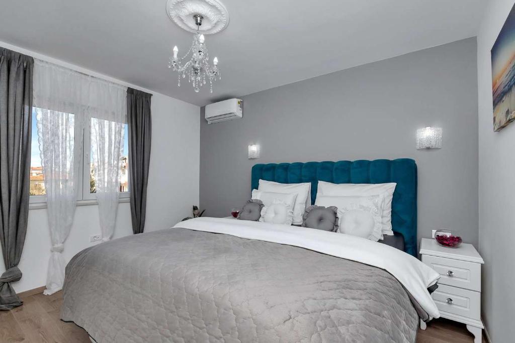 Postel nebo postele na pokoji v ubytování Luxurious Apartment Nino