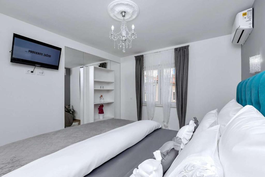 Postel nebo postele na pokoji v ubytování Luxurious Apartment Nino