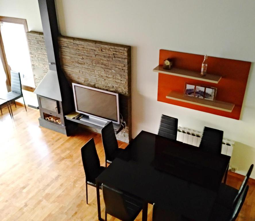 TV a/nebo společenská místnost v ubytování Fantástica casa adosada en Prullans