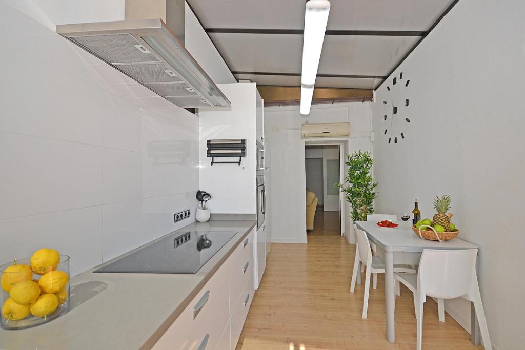 Kuchyň nebo kuchyňský kout v ubytování Apartment Can Xus