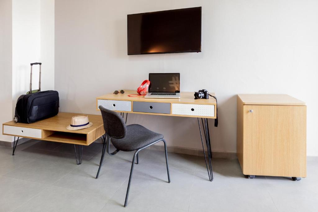 TV a/nebo společenská místnost v ubytování Ibis Styles Brindisi