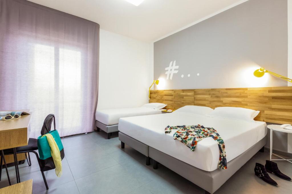 Postel nebo postele na pokoji v ubytování Ibis Styles Brindisi