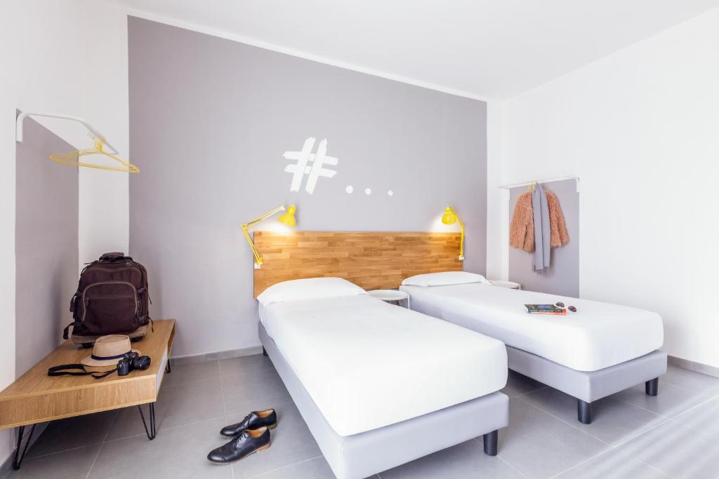Postel nebo postele na pokoji v ubytování Ibis Styles Brindisi