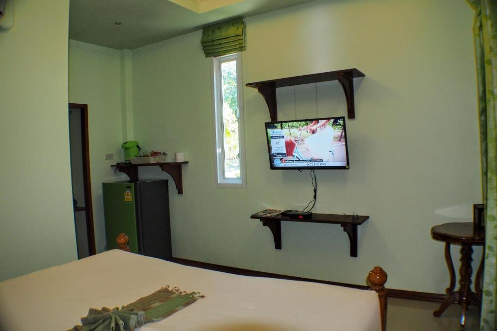 TV a/nebo společenská místnost v ubytování Pennapa Chalet