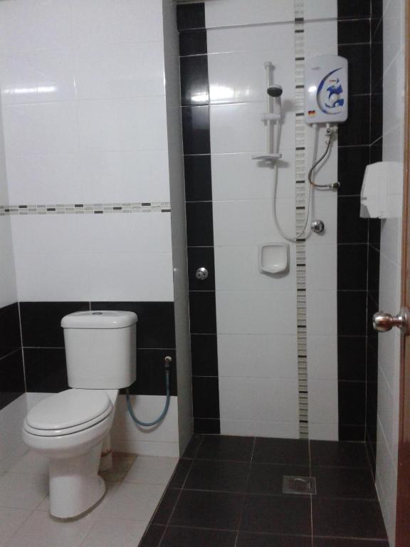 Koupelna v ubytování Hotel Damai