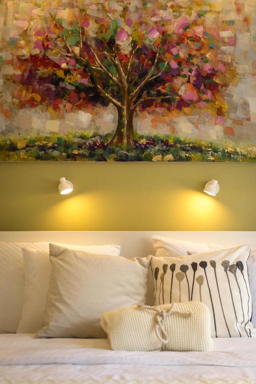 Łóżko lub łóżka w pokoju w obiekcie MirÓ Studio Apartments Zagreb