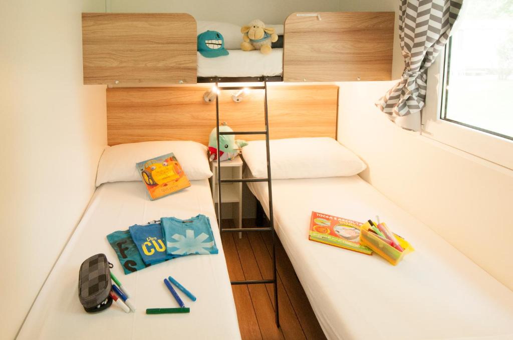 Voodi või voodid majutusasutuse Camping Serenissima toas
